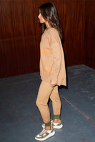 Thumbnail for caption_Model wears  Camel Clash Jogger in UK size 8/ US 4