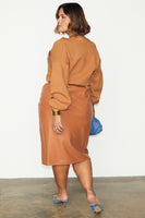 Thumbnail for caption_Model wears Camel Vegan Leather Jaspre Skirt in UK size 18/ US 14