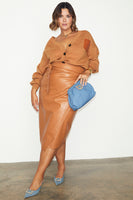 Thumbnail for caption_Model wears Camel Vegan Leather Jaspre Skirt in UK size 18/ US 14