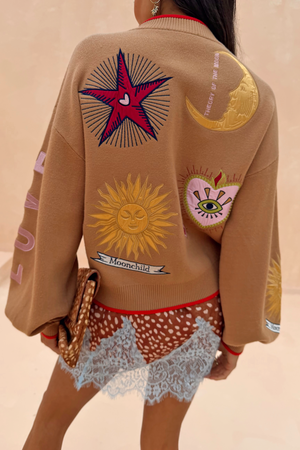 Camel Mystical Cardigan featuring embroidered sun and moon motifs on the back.