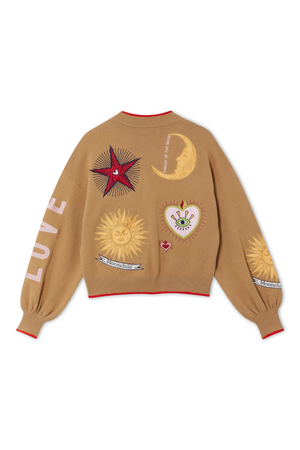 Back of Camel Mystical Cardigan featuring sun and moon embroidery and red tipped ribbed trims.