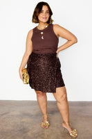 Thumbnail for caption_Model wears Chocolate Sequin Mini Jaspre Skirt in UK size 18/ US 14