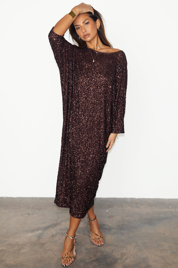 caption_Model wears Chocolate Sequin Jem Dress in UK size 10/ US 6