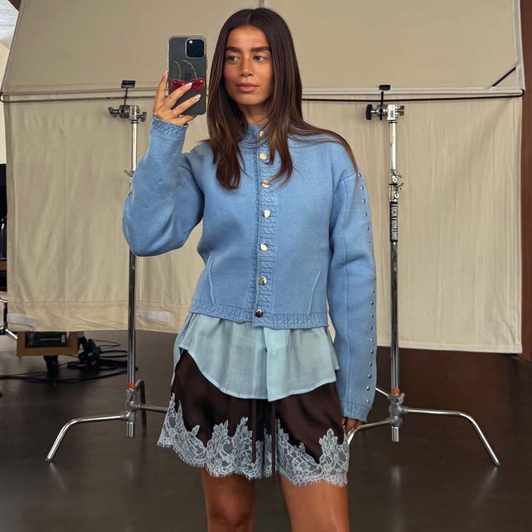 Chocolate and Blue Lace Shorts in brown satin with blue lace trim, styled with a blue cardigan for a London look.