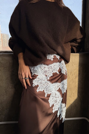 Chocolate Lily Skirt in satin with light blue lace detailing, styled with a cosy brown jumper.