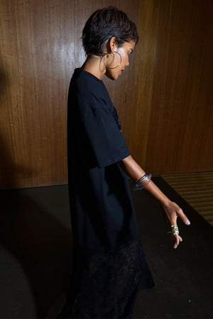 Black Dance Sequin Cara T Shirt Dress featuring a cotton top with sequin details and a lace skirt insert.