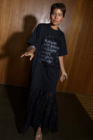 Black Dance Sequin Cara T Shirt Dress featuring a slogan sequin panel and a flowing lace skirt insert.