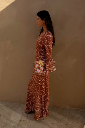 Fawn Soho Dress in brown and cream spotted deer print with flared long sleeves and a maxi silhouette.