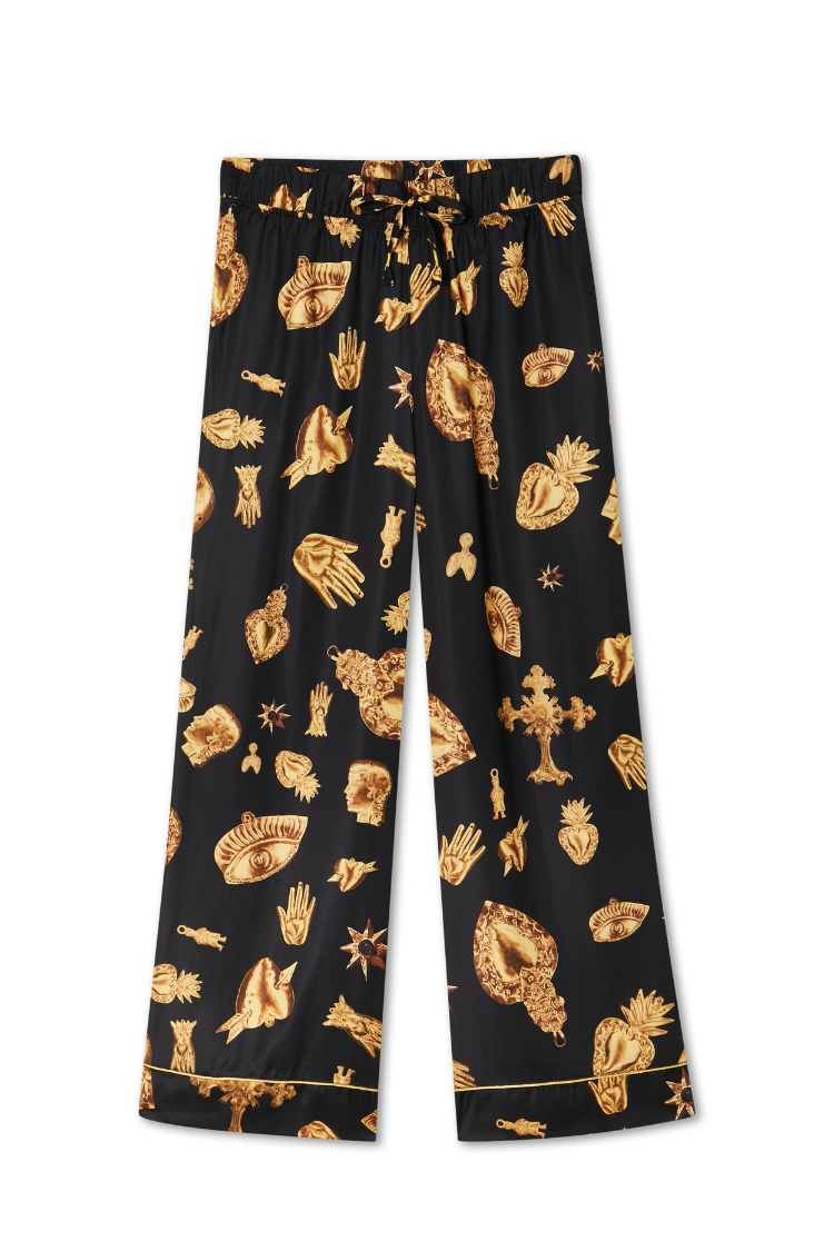 Black Deloris pyjama bottoms featuring gold hand, heart and eye motifs with an elasticated drawstring waistband.
