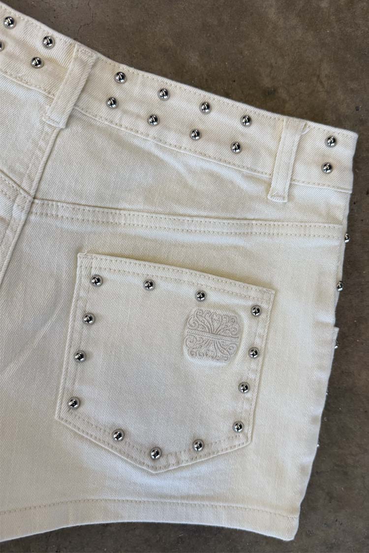 Ecru Studded Hot Pant back pocket detail with silver studs on a cream cotton base and tonal embroidery.