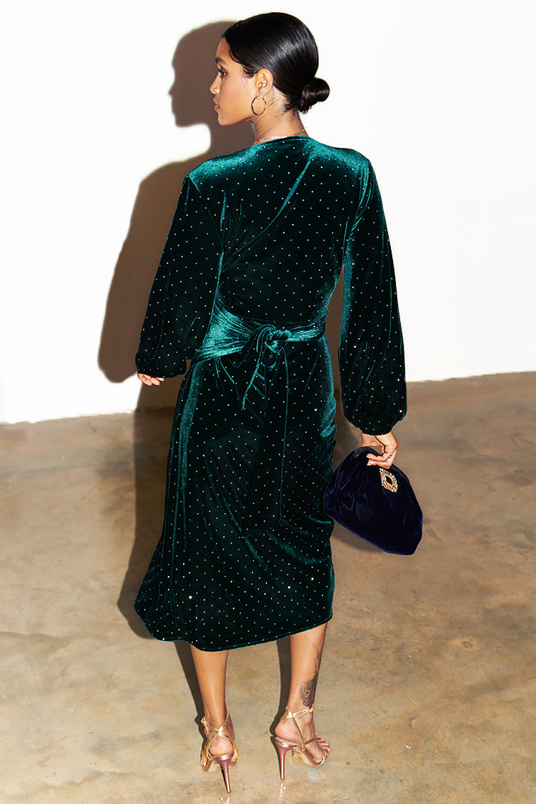 caption_Model wears Emerald Velvet Violet Wrap Dress in UK 8 / US 4