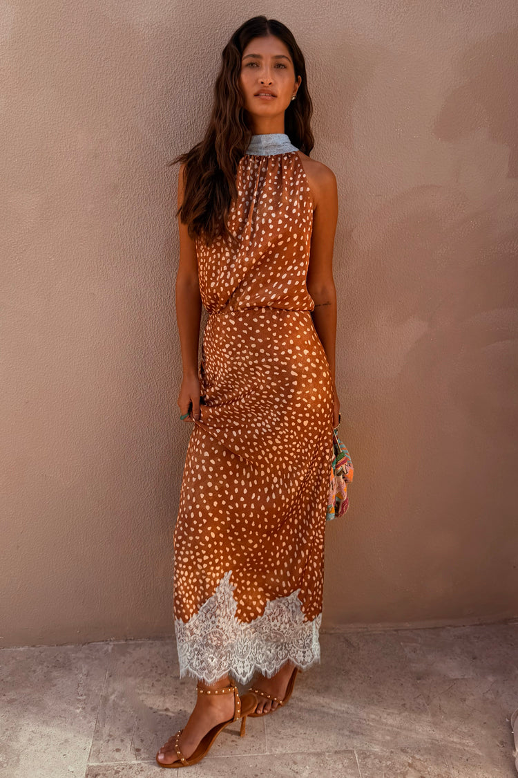 Fawn Midi Maeva Skirt with a brown spotted print and delicate white lace border, shown on a model.