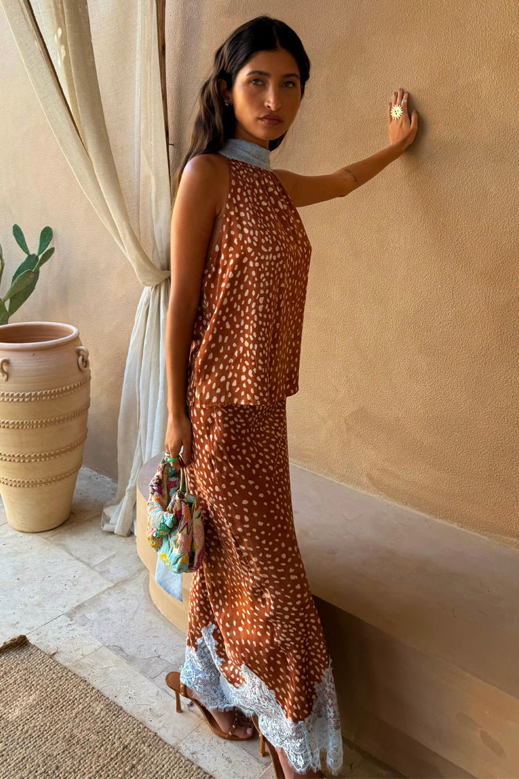 Fawn Lily Top with blue lace trim, styled with a matching fawn print skirt and colourful beaded bag.