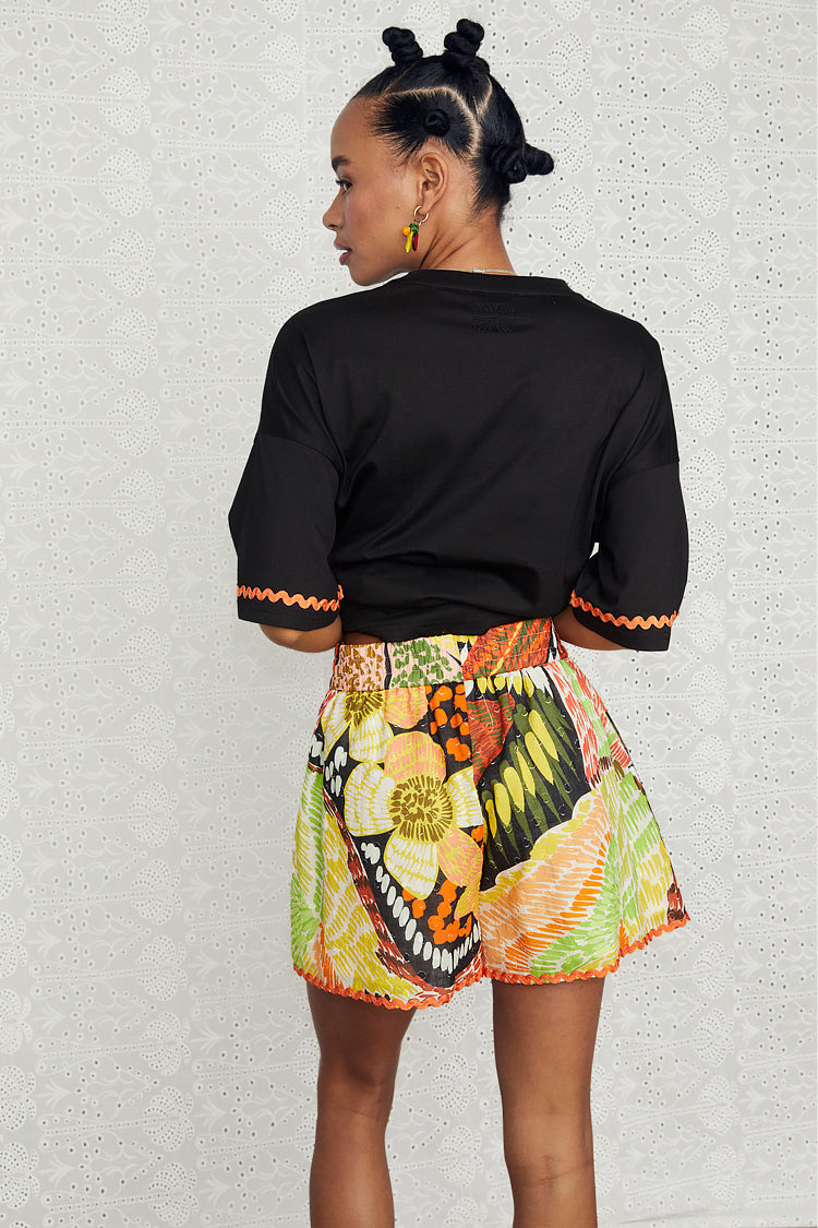 caption_Model wears Fiji Elissa Shorts in UK size 10/ US 6