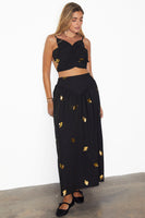 Thumbnail for caption_Model wears Black Marra Skirt With Gold Fish Fleck in UK size 10/ US 6