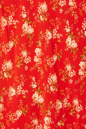 Red Floral Midi Skirt detail featuring the red viscose fabric and white floral print.