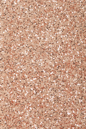 Shimmering gold sequin fabric detail from the Gold Sequin Tank Top, highlighting the high-shine metallic texture.