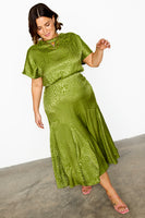 Thumbnail for caption_Model wears Green Jacquard Midi Erin Dress in UK size 18/ US 14