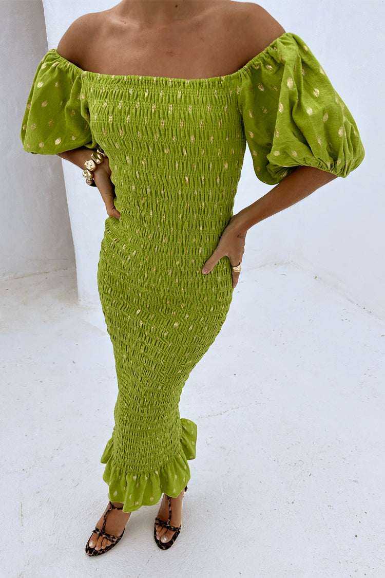 Olive Jojo Dress with Gold Fleck, shirred body and puff sleeves, worn off-the-shoulder by a 5ft5 model in UK size XS.