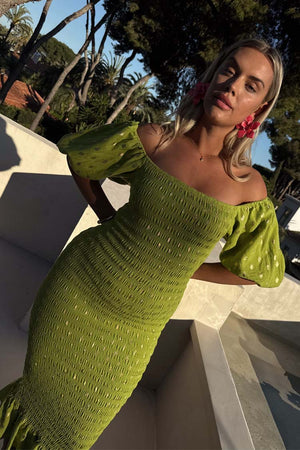 Olive Jojo Dress with gold fleck print, shirred bodice and off-the-shoulder puff sleeves.