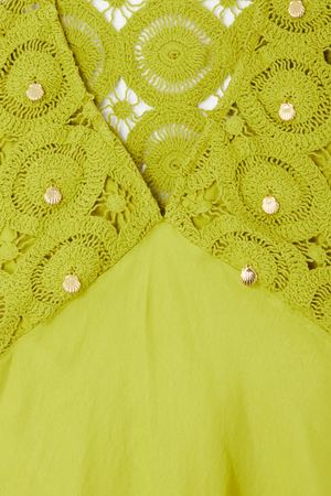 Green Shell Mini Elodie Dress detail featuring lime crochet knit, satin, and gold shell charms.
