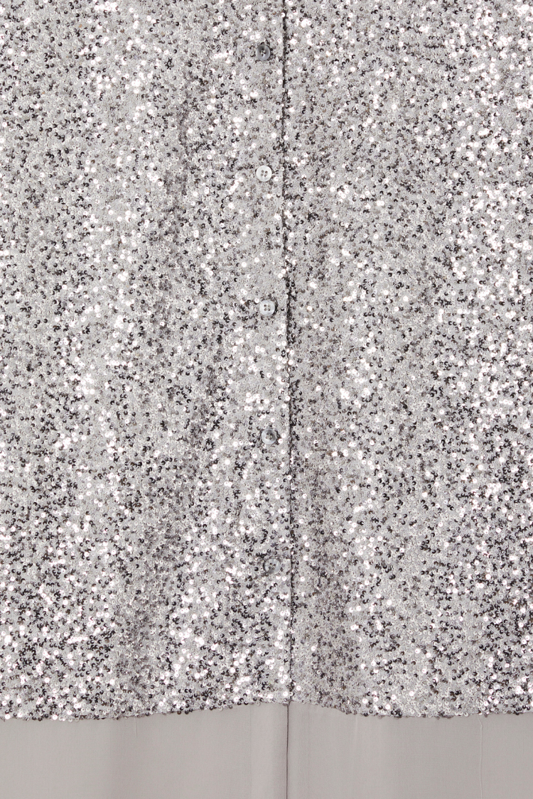 Shimmering gunmetal silver sequins and button-up front detail on the Lila Shirt Dress.