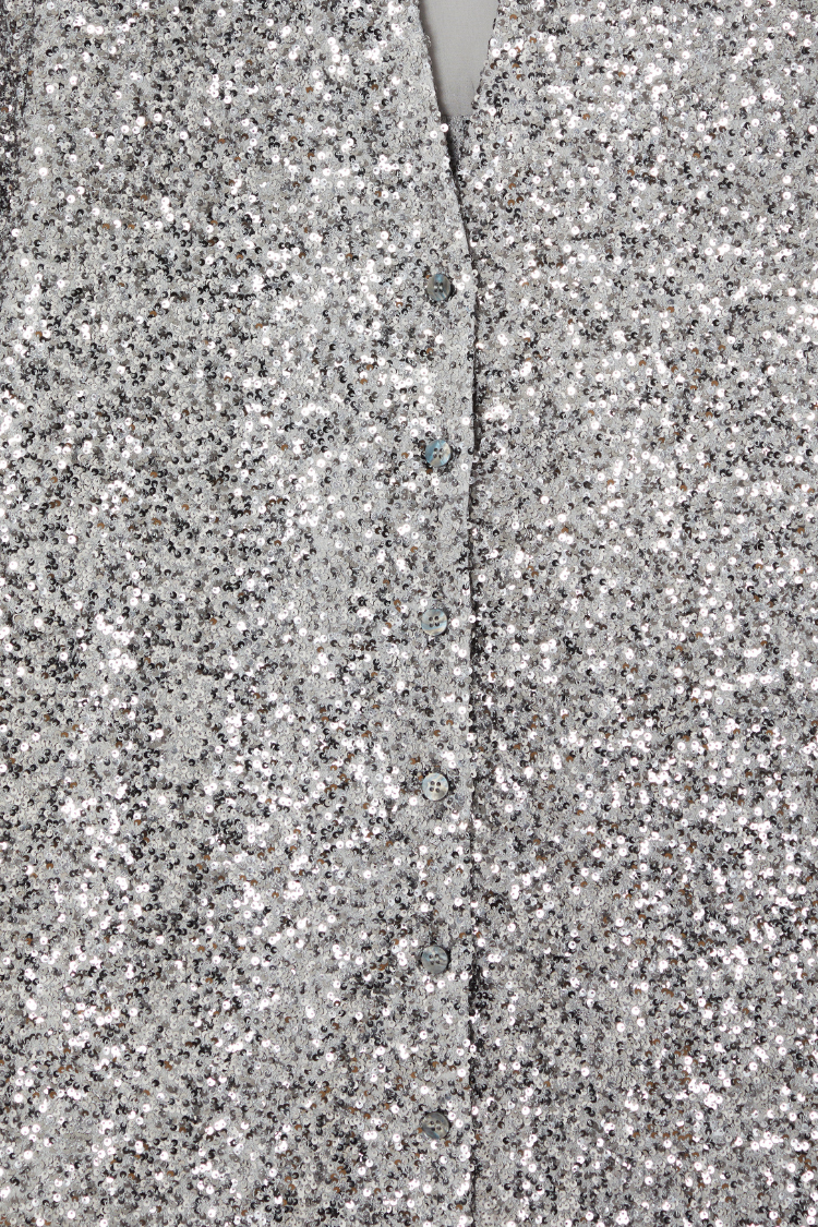 Detail of the Gunmetal Sequin Miley Shirt highlighting shimmering silver sequins and button-up fastening.