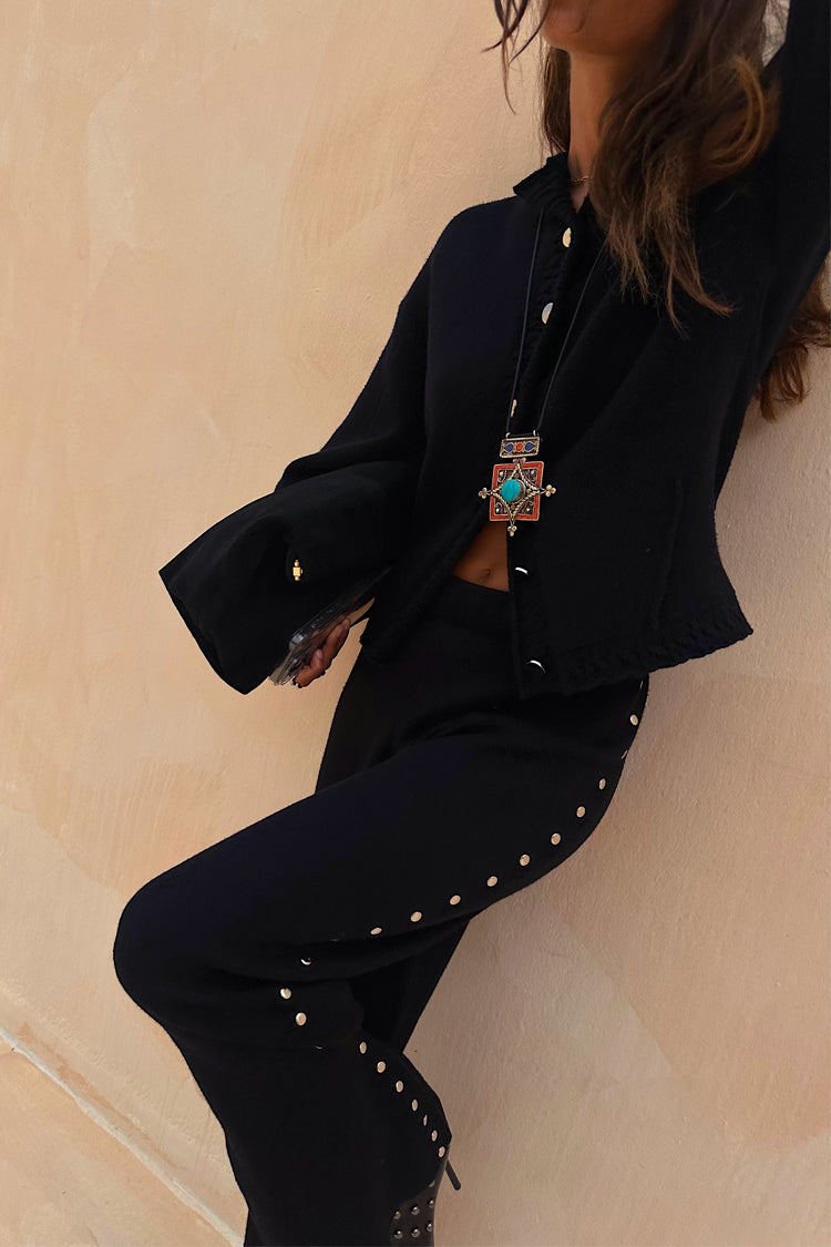 Black Studded Knit Trousers and Cardigan co-ord with silver metal studs along the sides and buttons.