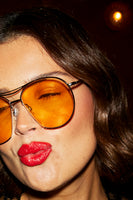 Thumbnail for Close up of model wearing sunglasses and pouting