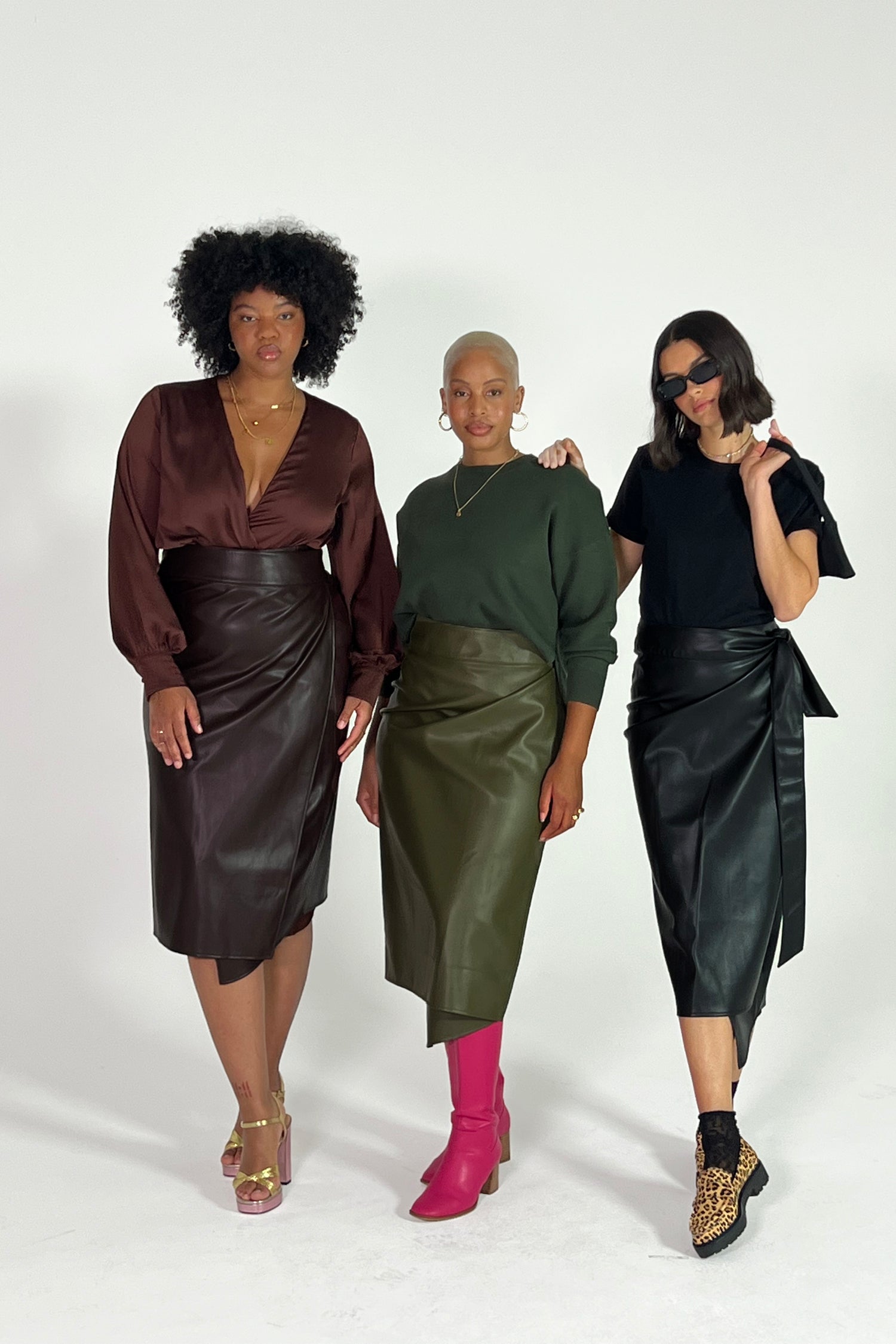 Models wearing Vegan Leather Jaspre Skrirts in brown, khaki and black