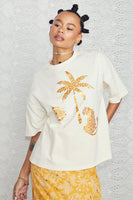 Thumbnail for caption_Model wears Cream and Gold Mosaic Leopard T-Shirt in UK size 10/ US 6