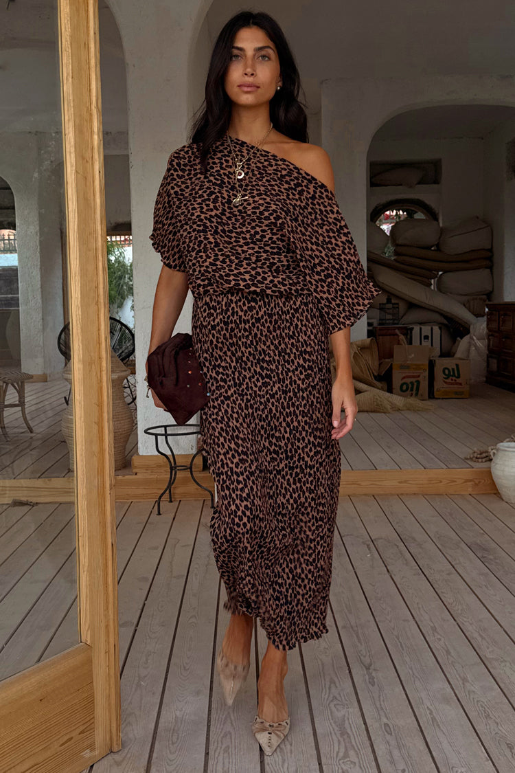Petite Lucia Leopard Tilly Dress in brown leopard print plisse, styled off-the-shoulder in a rustic setting.