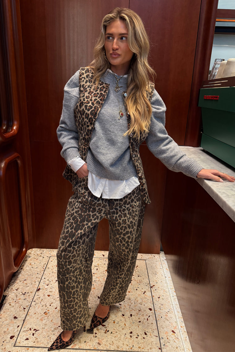 Iconic cotton Leopard Waistcoat layered over a grey jumper and matching barrel jeans for a statement London look.