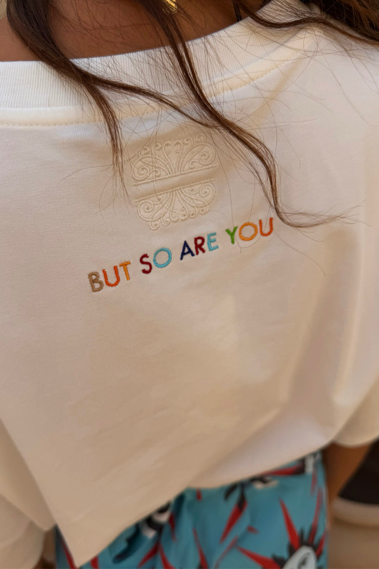 White Life Is Tough T-Shirt back detail featuring colourful 'BUT SO ARE YOU' embroidery and a tonal logo.