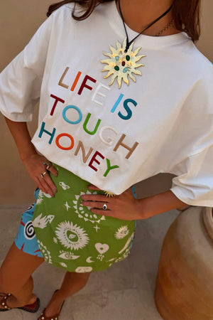 White Life Is Tough Embroidered T-Shirt featuring a colourful slogan and a relaxed, dropped shoulder fit.