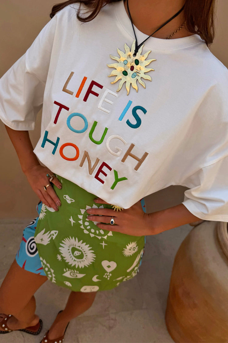 White Life Is Tough Embroidered T-Shirt featuring a colourful slogan and a relaxed, dropped shoulder fit.