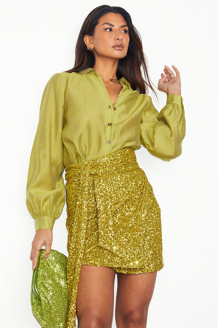 caption_Model wears Lime Sequin Mini Jaspre Skirt in UK size 10/ US 6
