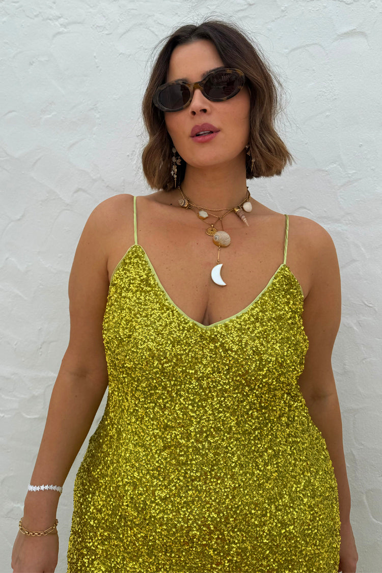 caption_Model wears  Lime Sequin Slip Dress in UK size 18 / US 14