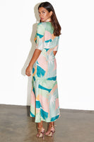 Thumbnail for caption_Model wears Sage Lyra Poppy Midi Dress in UK size 10/ US 6