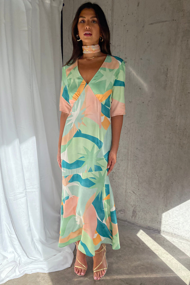 caption_Model wears Sage Lyra Poppy Midi Dress in UK size 10/ US 6