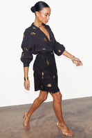 Thumbnail for caption_Model wears Black Snake Mini Wrap Skirt in UK size 10/ US 6