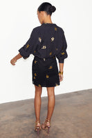 Thumbnail for caption_Model wears Black Snake Mini Wrap Skirt in UK size 10/ US 6