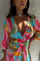 Thumbnail for caption_Model wears Multi Abstract Vienna Mini Wrap Dress in UK size 10/ US 6
