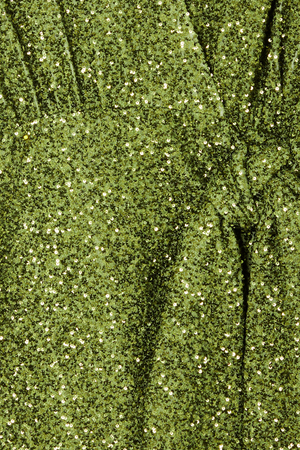 Olive Sequin Mini Vienna Dress detail highlighting the green sequin fabric and wrap tie fastening.