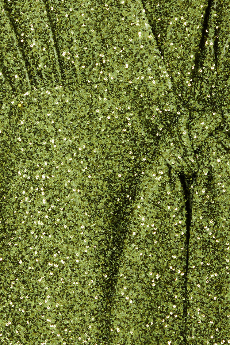 Olive Sequin Mini Vienna Dress detail highlighting the green sequin fabric and wrap tie fastening.