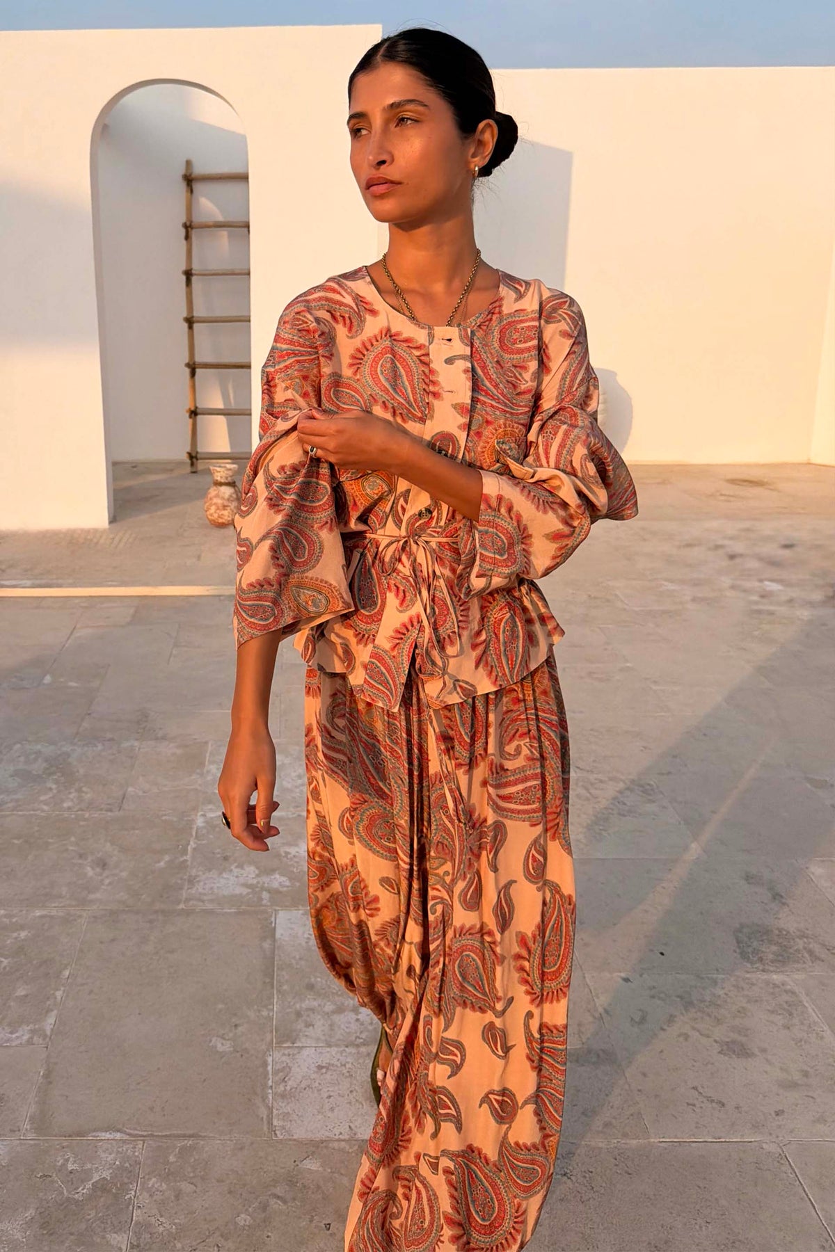 Peach paisley balloon trousers and matching tie-waist shirt styled as a summer co-ord set.