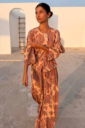 Peach paisley balloon trousers and matching tie-waist shirt styled as a summer co-ord set.