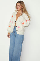 Thumbnail for caption_Model wears Cream Cardigan With Embroidered Palm in UK size 10/ US 6