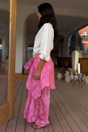 Pink bandana print Miley shirt tied at the waist over matching trousers and a white top for a multi-wear look.