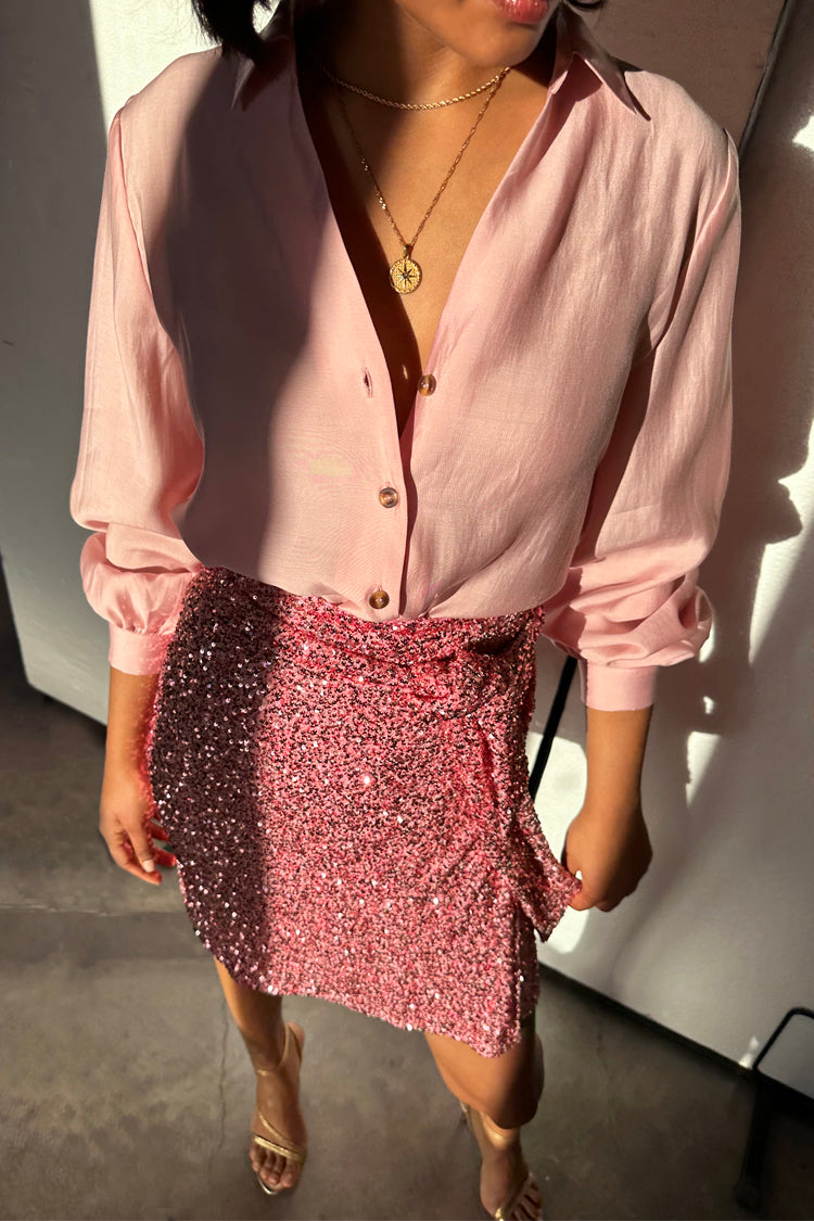 caption_Model wears Pink Sequin Mini Jaspre Skirt in UK size 10/ US 6